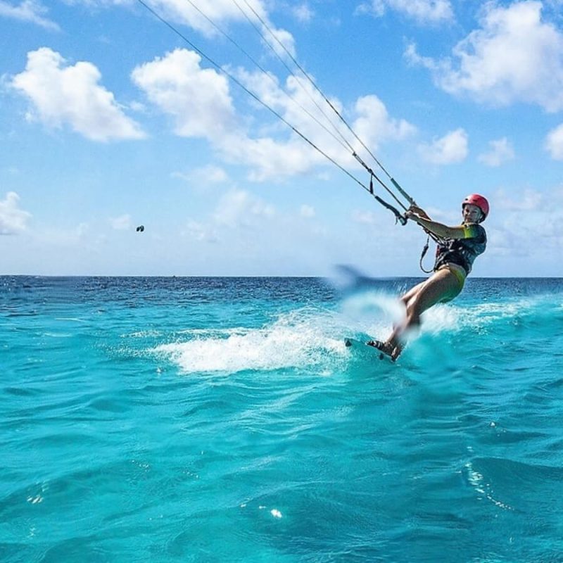 Kiteboarder receiving a training lesson