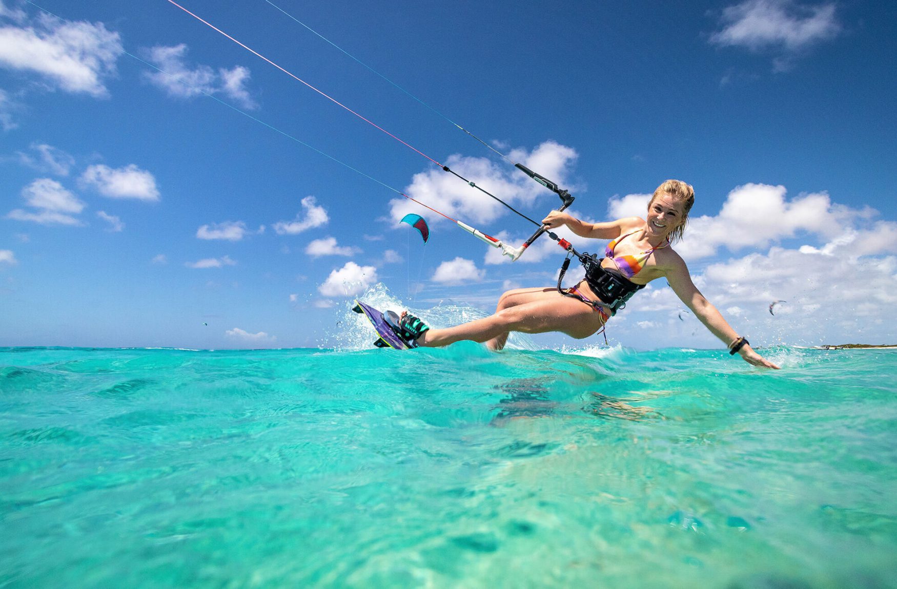 Woman kiteboarding in Bonaire